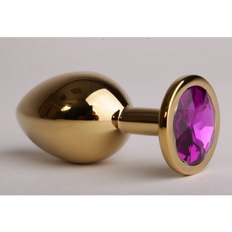 Анальная пробка золотая с фиолетовым кристаллом
