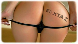 Татуировка на попе логотипа секс шоп экстаз