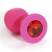 Анальная пробка из силикона с красным стразом в основании размер М, розовая