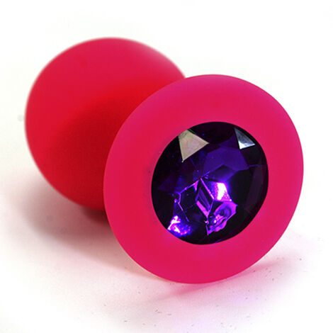 Анальная пробка из силикона с темно-фиолетовым стразом в основании размер М, розовая